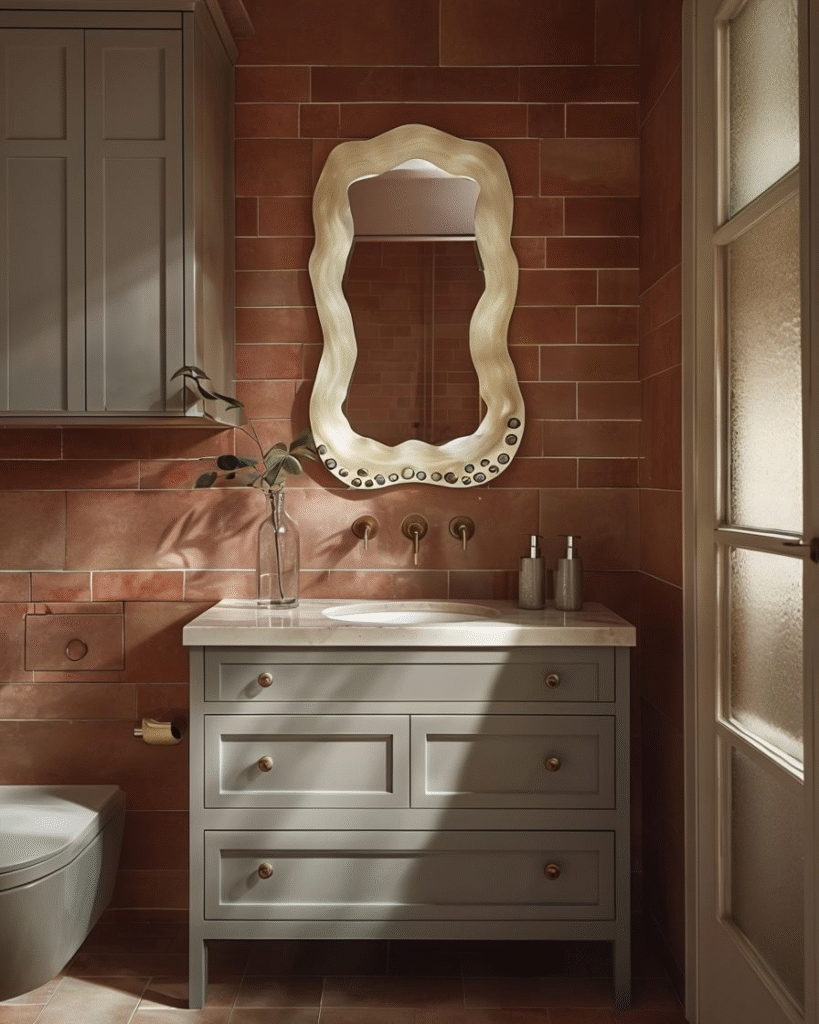 Modern Bathroom With Gray Vanity And Terra Cotta Tiles